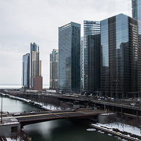 Skyline view of downtown New York bridge